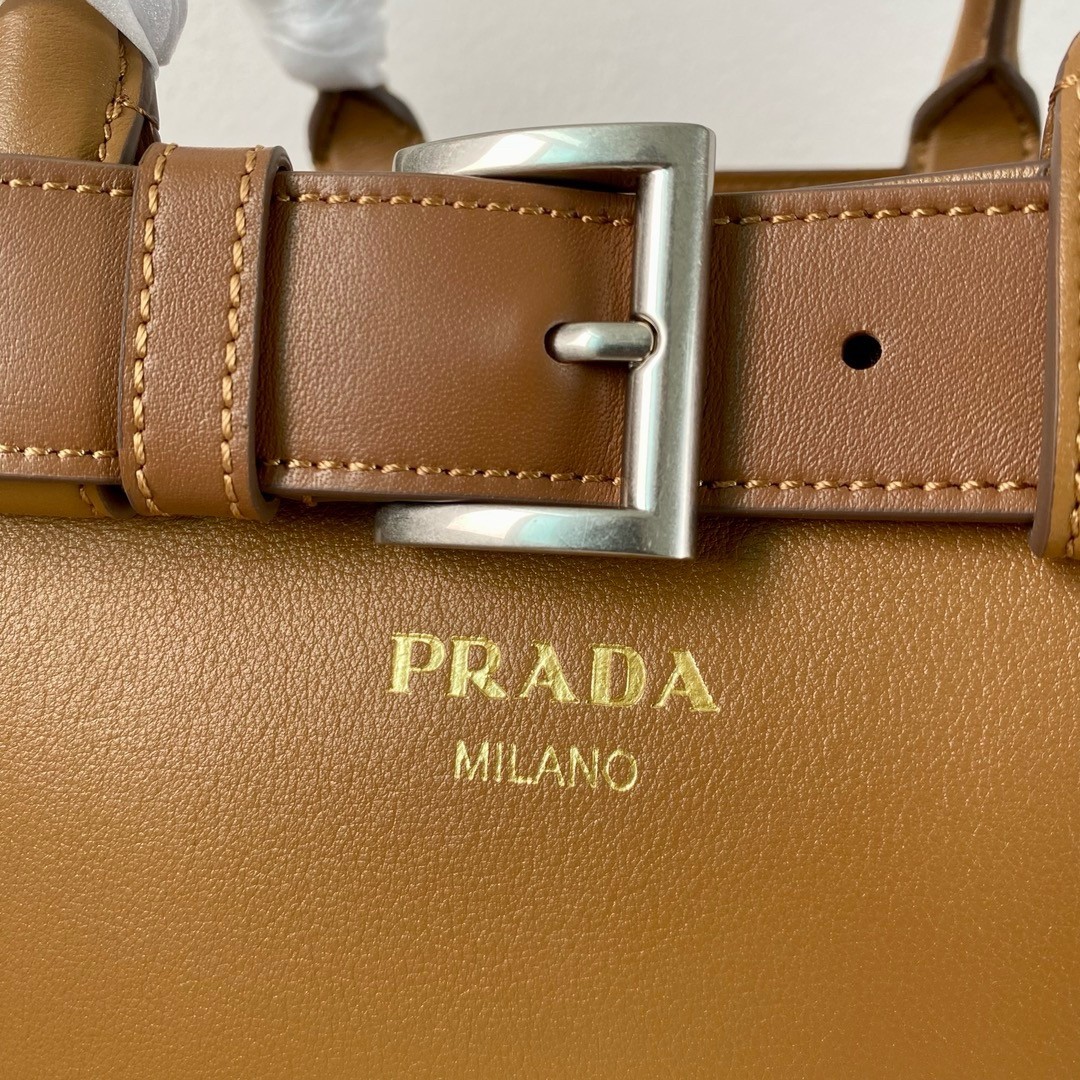 Pra*a buckle medium bag with belt in brown leather