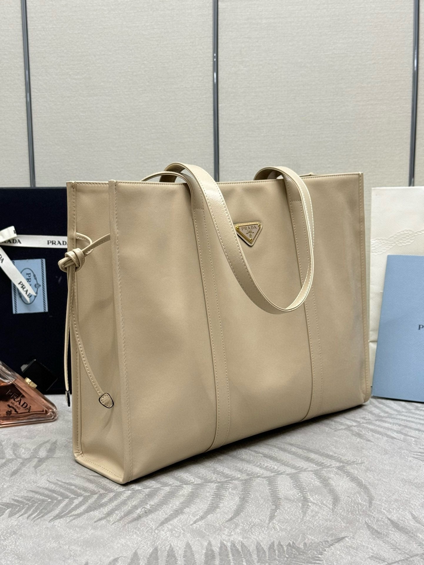 Pra*a large tote bag in beige lambskin