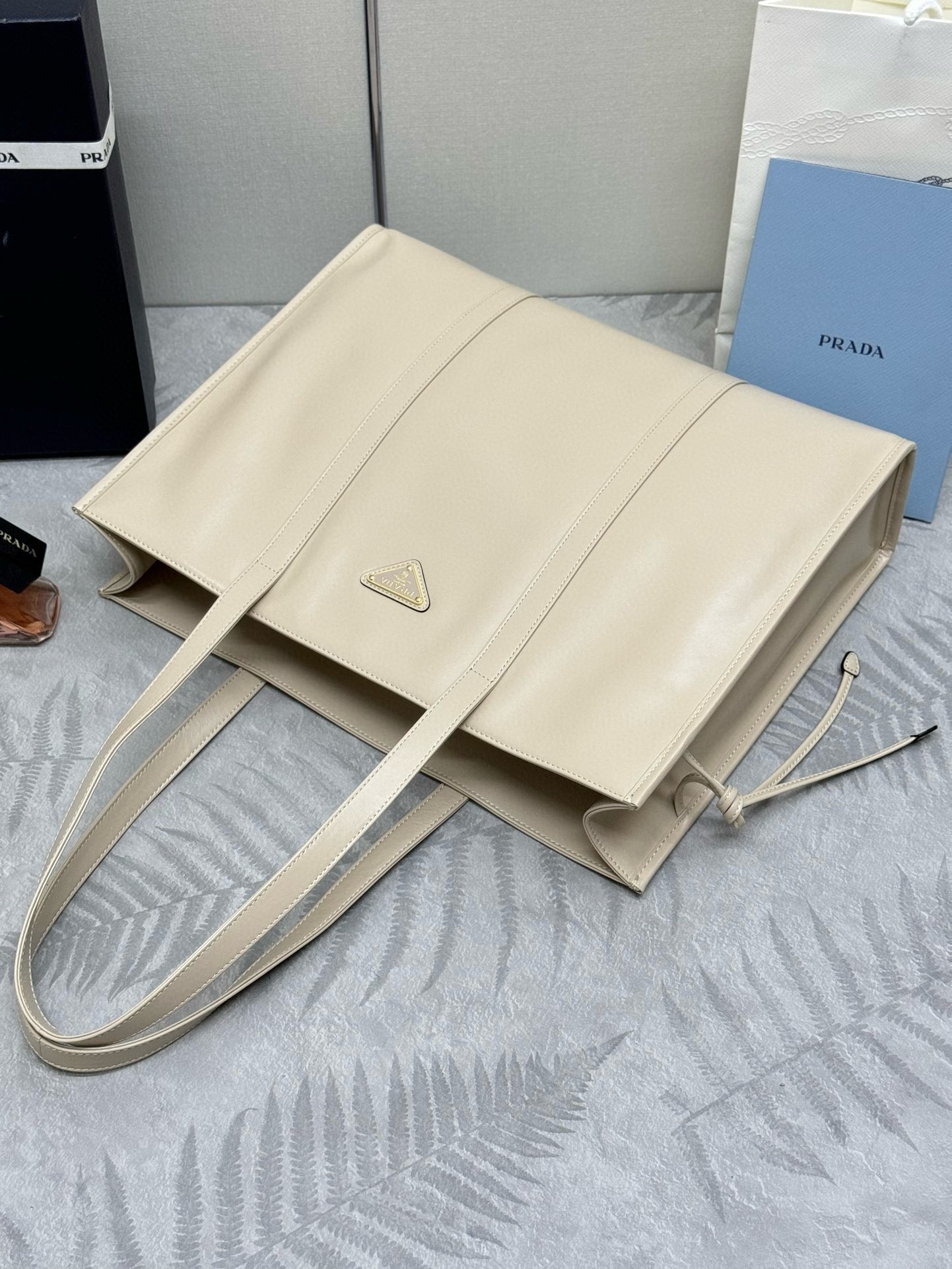 Pra*a large tote bag in beige lambskin