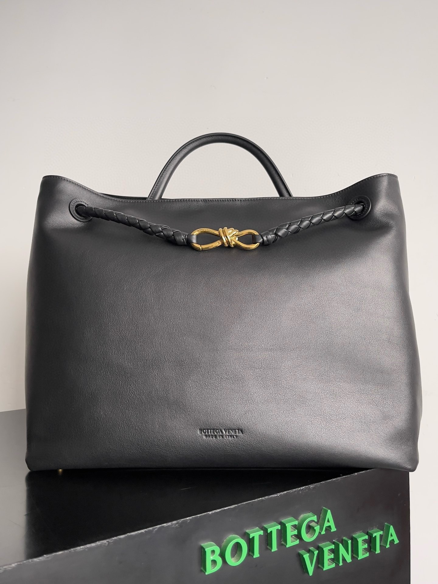 bo*te*ga Ve*ne*ta large andiamo bag in black smooth calfskin