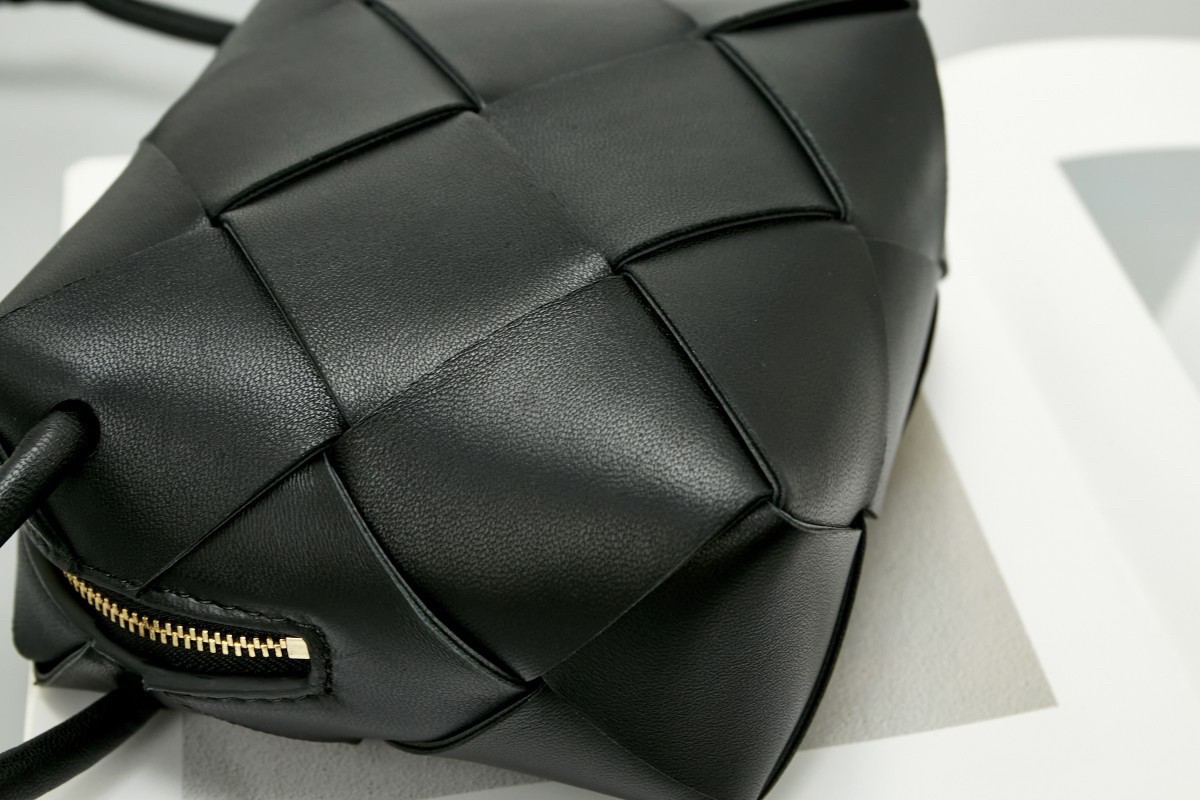 bo*te*ga Ve*ne*ta mini cassette camera bag in black lambskin