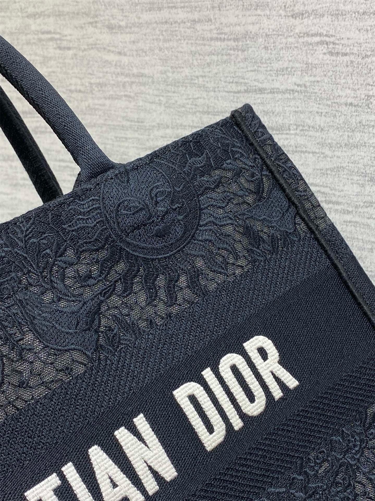 D*or medium book tote bag in black toile de jouy soleil macramé embroidery