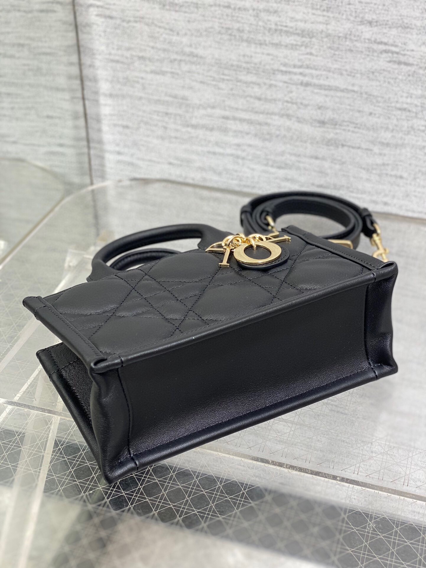 D*or mini book tote bag with strap in black macrocannage calfskin