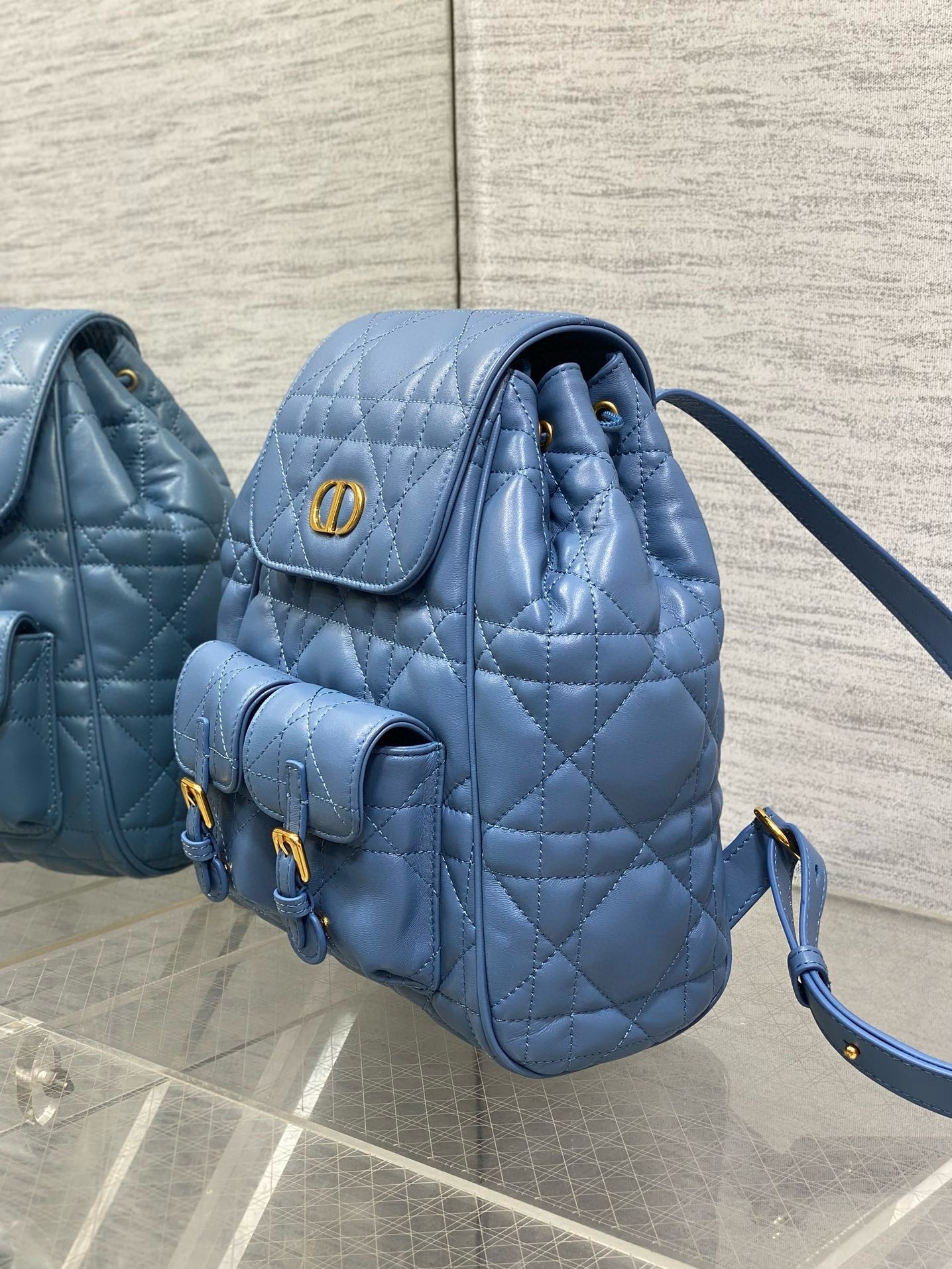 D*or caro medium backpack in blue macrocannage lambskin