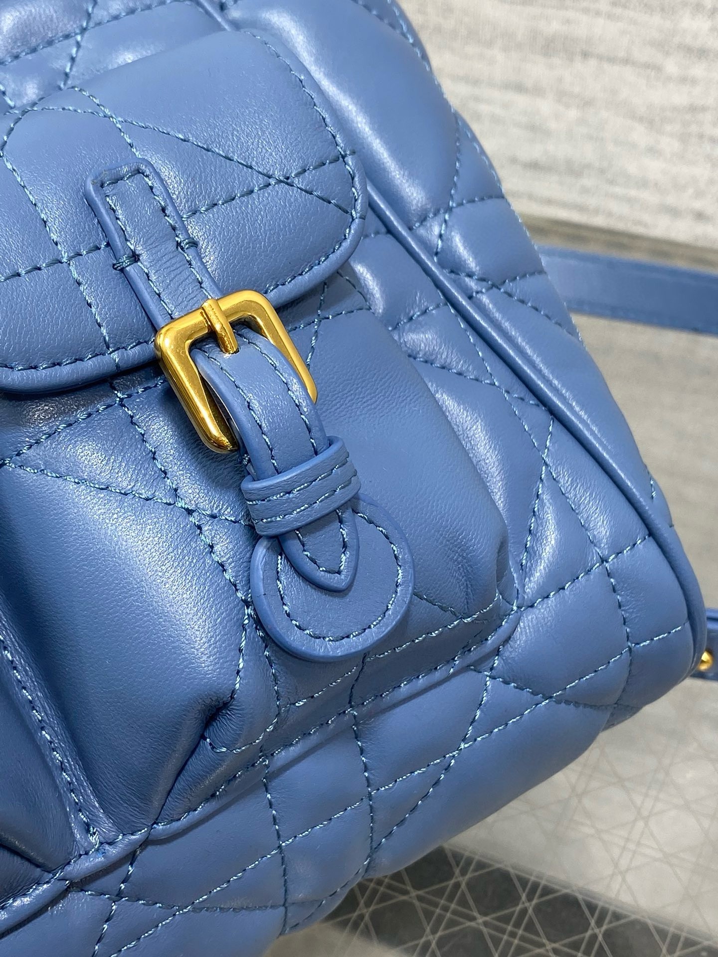 D*or caro medium backpack in blue macrocannage lambskin