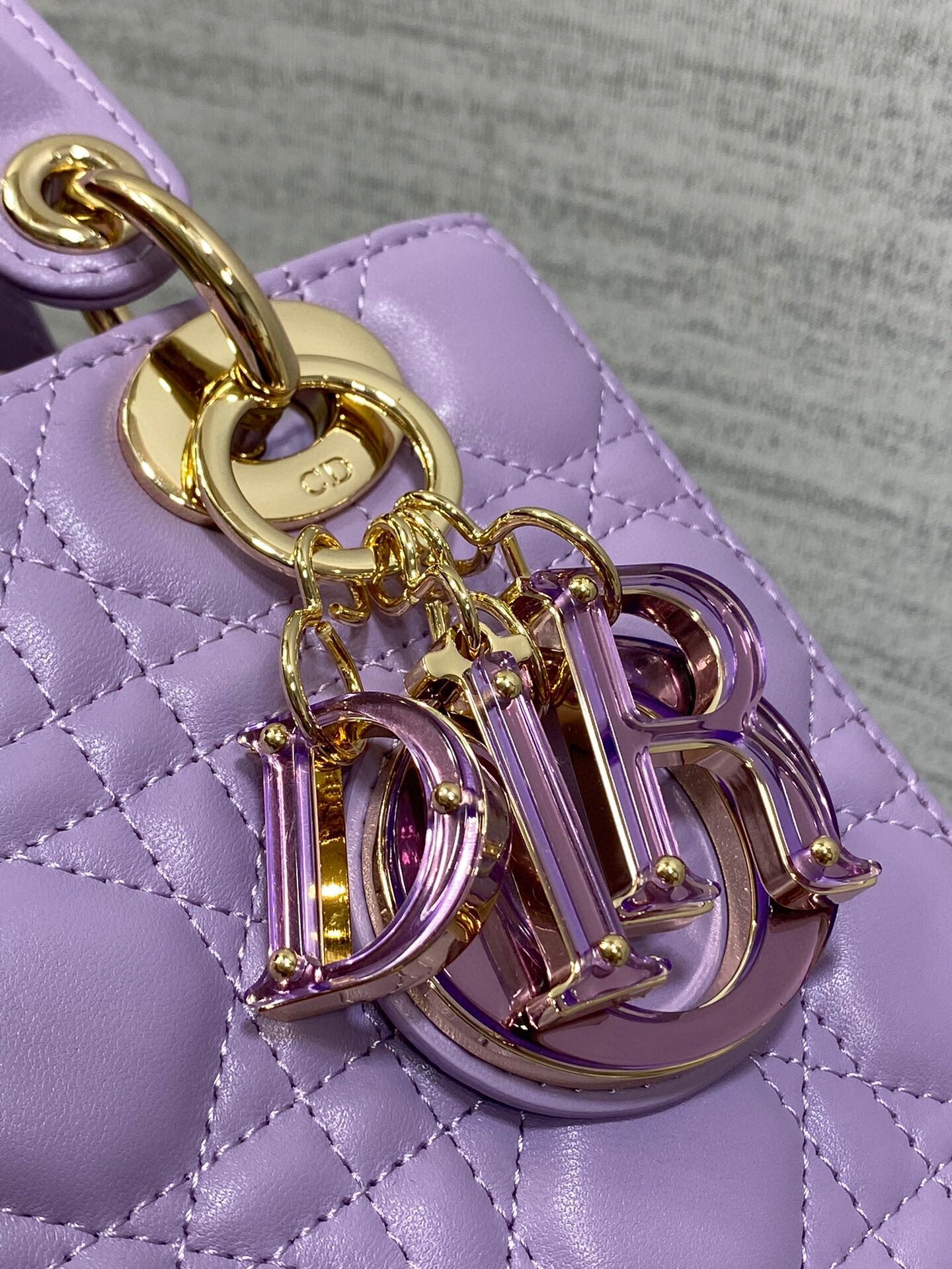 D*or small lady D*or bag in lilas lambskin with resin charms