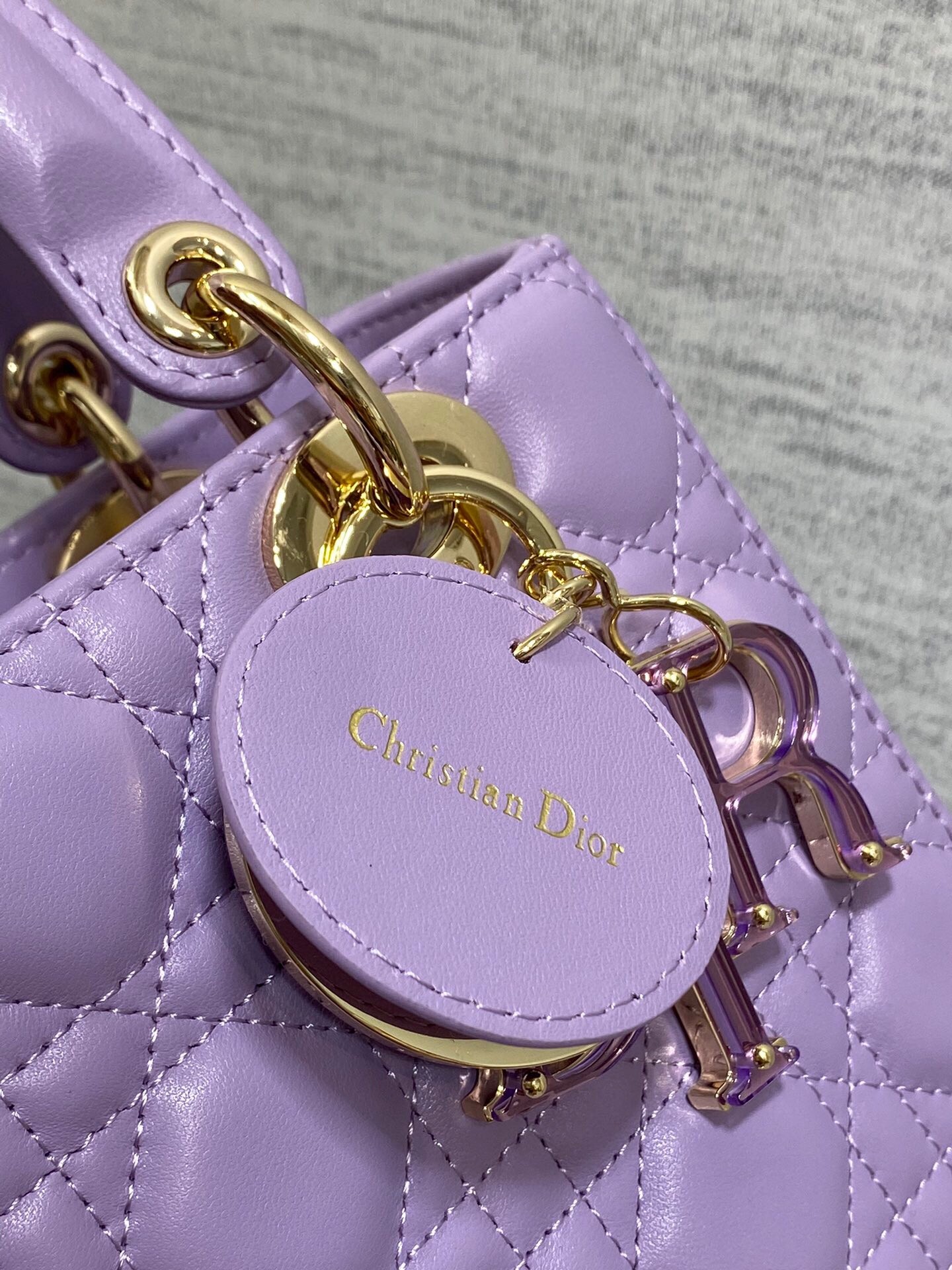 D*or small lady D*or bag in lilas lambskin with resin charms