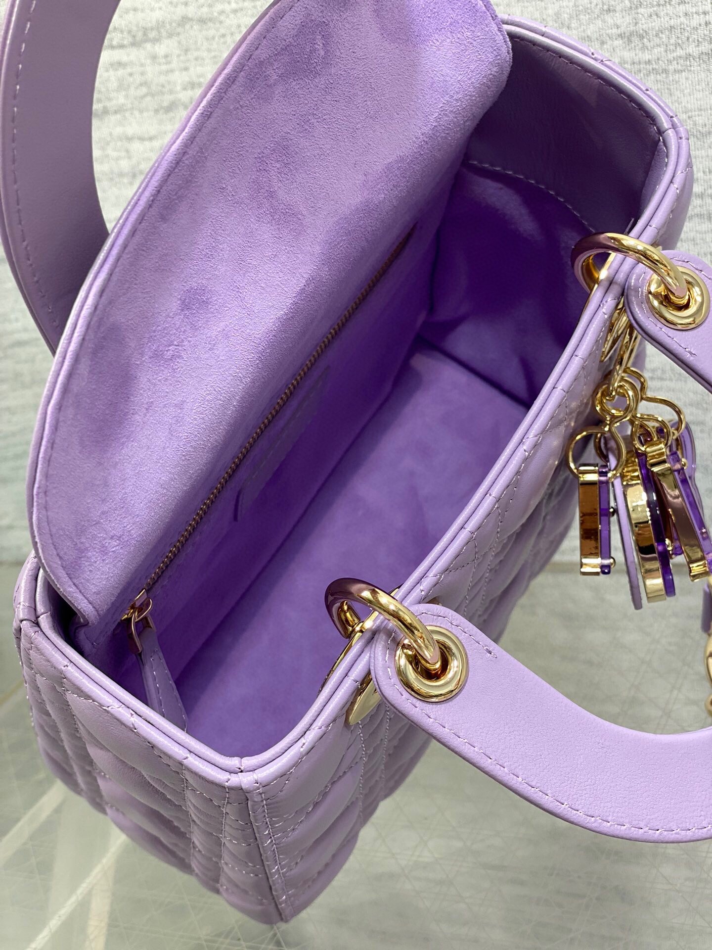 D*or small lady D*or bag in lilas lambskin with resin charms