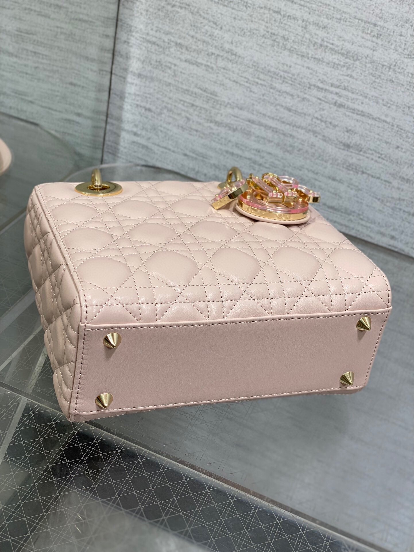 D*or small lady D*or bag in pink lambskin with resin charms