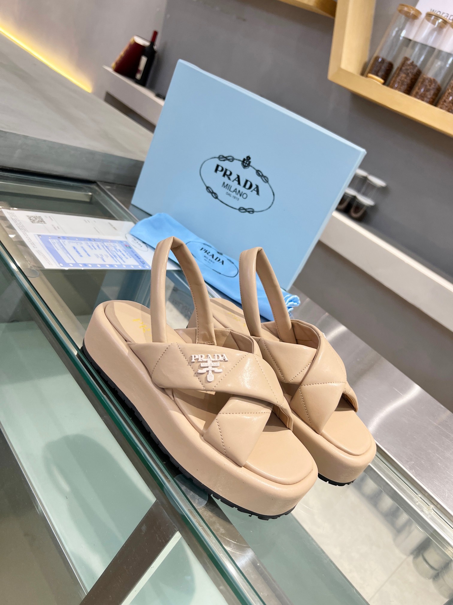 Pra*a flatform sandals in beige quilted nappa leather