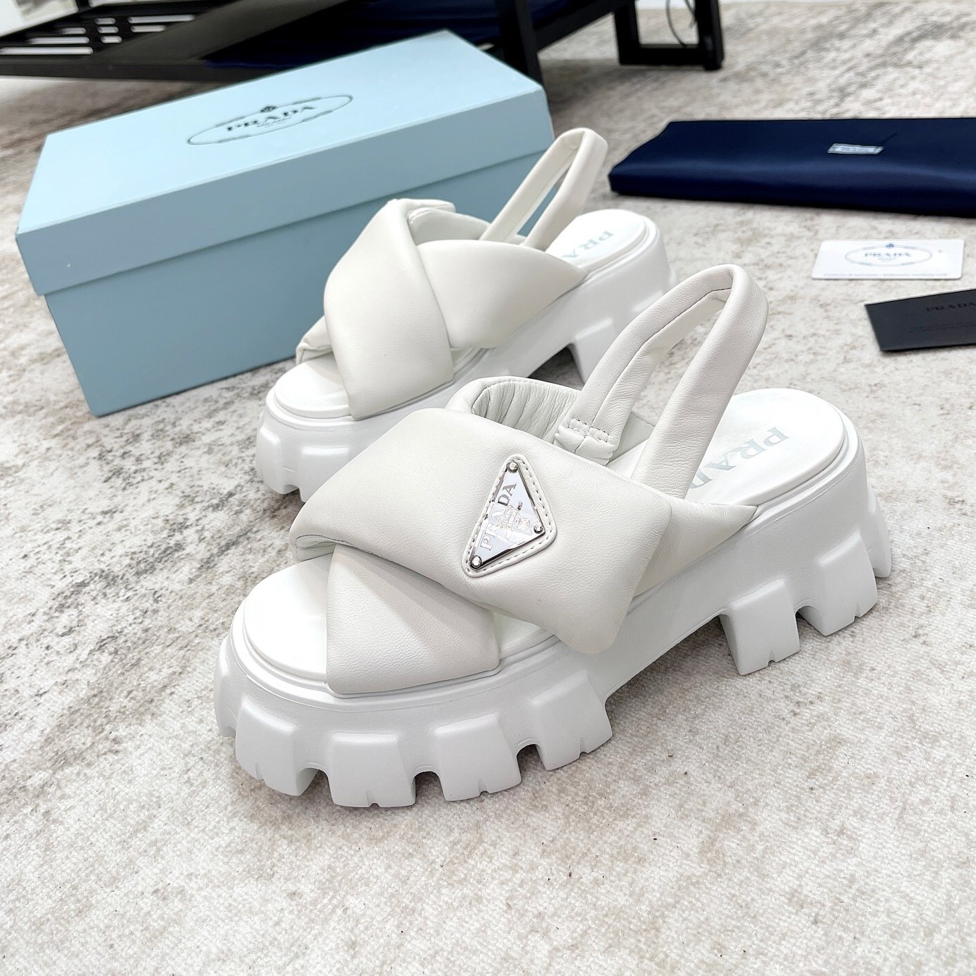 Pra*a monolith padded sandals in white nappa leather