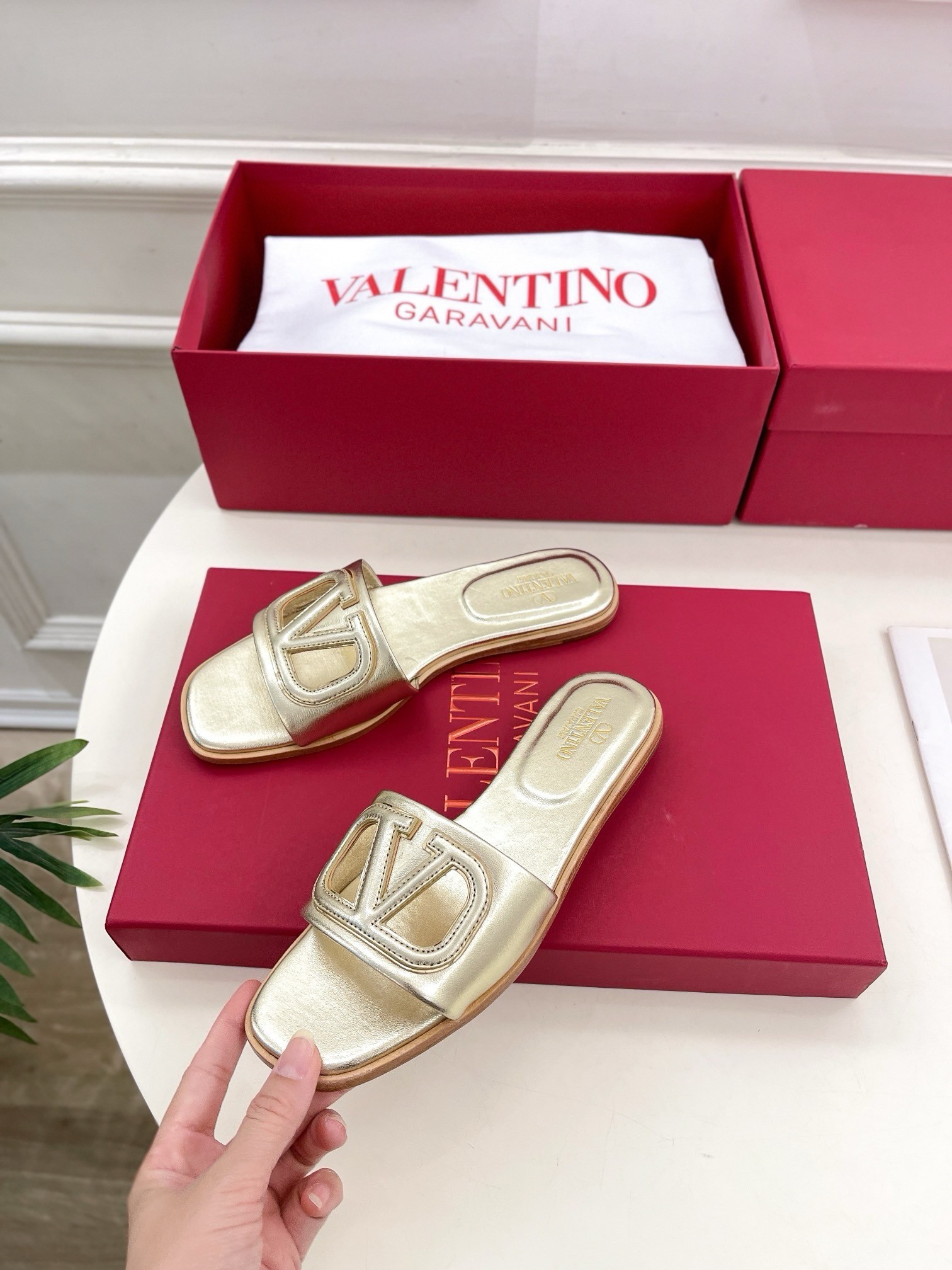 Valentino VLogo Cut-out Slide Sandals in Gold Metallic Leather