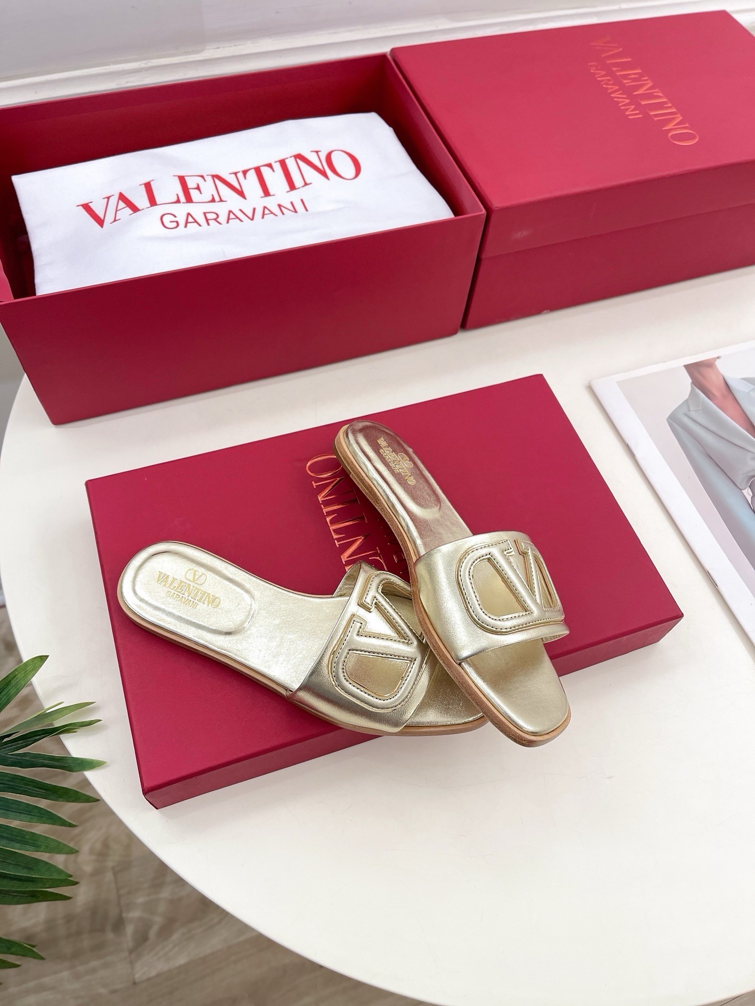 Valentino VLogo Cut-out Slide Sandals in Gold Metallic Leather