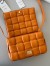 Bottega Veneta Padded Cassette Bag In Orange Lambskin